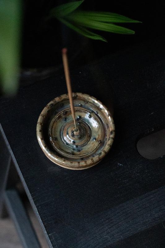 Iota incense stick holder